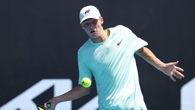 Cruz Hewitt plays a forehand during a training session. Picture: Getty