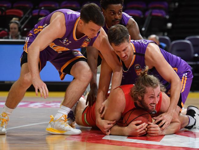 Wildcats Jesse Wagstaff is tackled during Game 3 of the NBL Finals match between Sydney Kings and Perth Wildcats at Qudos Bank Arena in 2020. Picture: AAP Image/Mick Tsikas.