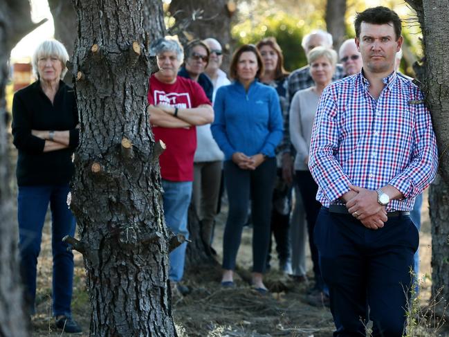 Ben Seale with Dural residents who hit out against a proposal for seniors housing at 3 Quarry Rd and 4 Vineys Rd, Dural. Picture: Sue Graham