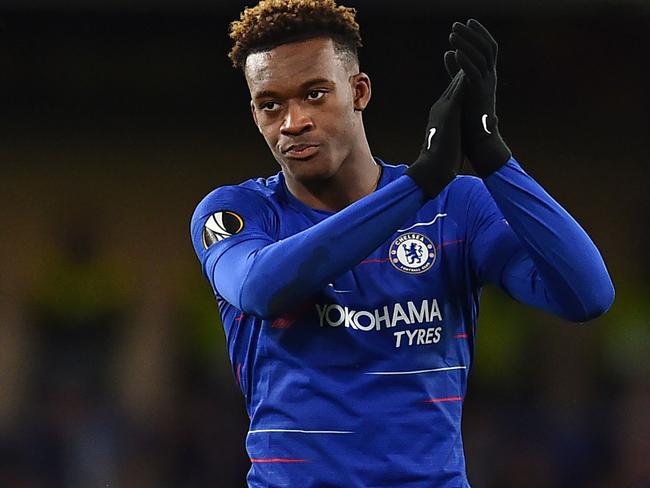 (FILES) In this file photo taken on March 7, 2019 Chelsea's English midfielder Callum Hudson-Odoi applauds supporters on the pitch after the first leg of the UEFA Europa League round of 16 football match between Chelsea and Dynamo Kiev at Stamford Bridge stadium in London. - Chelsea teenager Callum Hudson-Odoi was called up by England for the first time on Monday, March 18, 2019 amid a series of withdrawals due to injury. (Photo by Glyn KIRK / AFP)