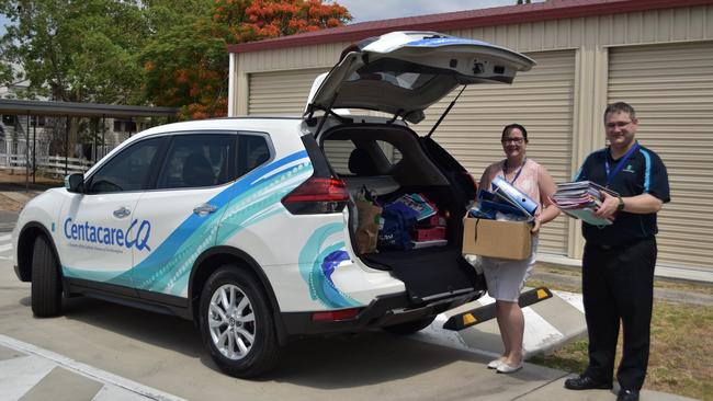 CentacareCQ Risk and Innovation Leisa Kilsby and Director Robert Sims prepare for School Savvy with community donations of stationery supplies.