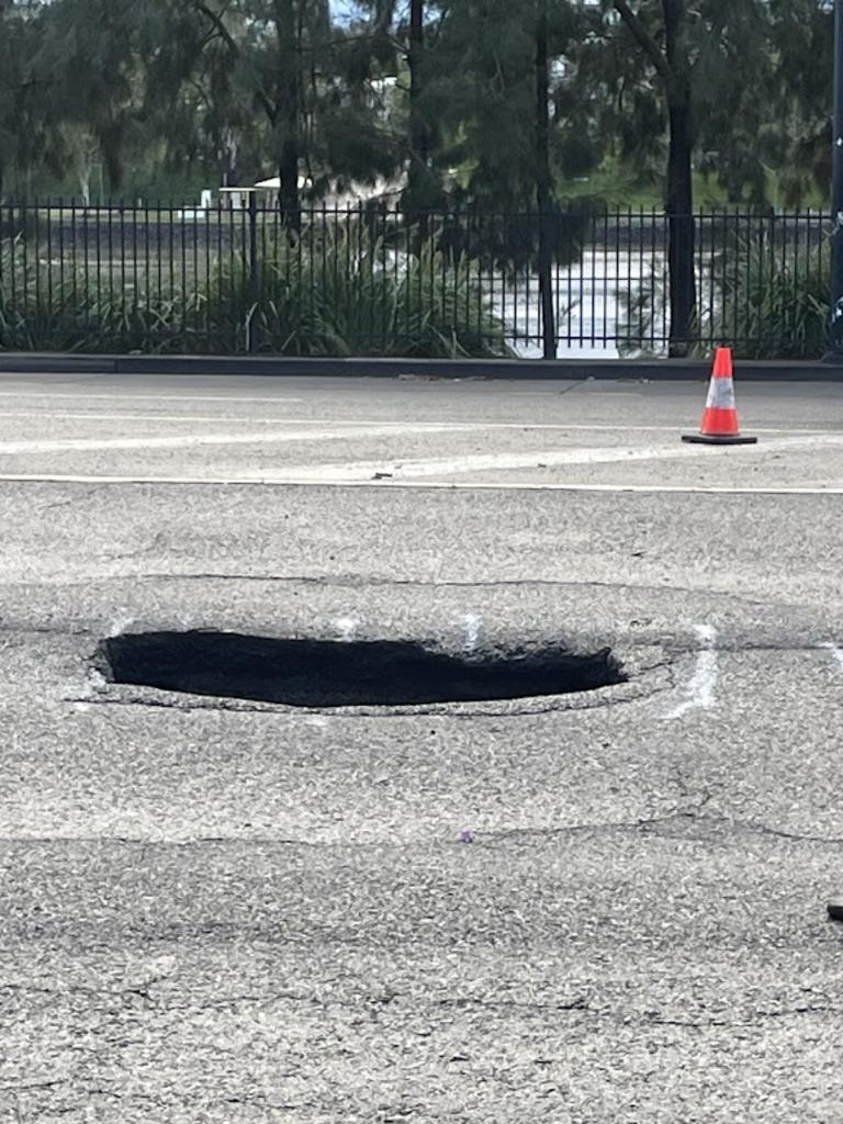 Brisbane weather: ‘Surprise’ storms lash SEQ as sink hole causes ...