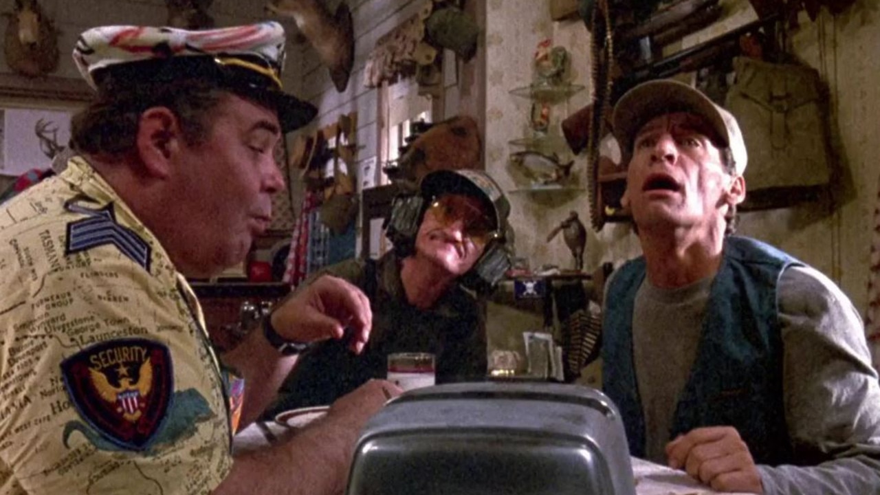 Byrge (centre) with Ernest titular co-star Jim Varney (right).