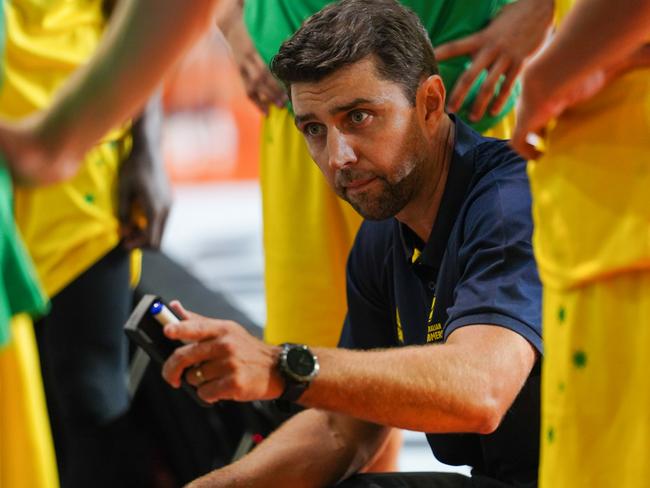 Adam Caporn address Boomers players in Cairns, 2021. Picture: Basketball Australia