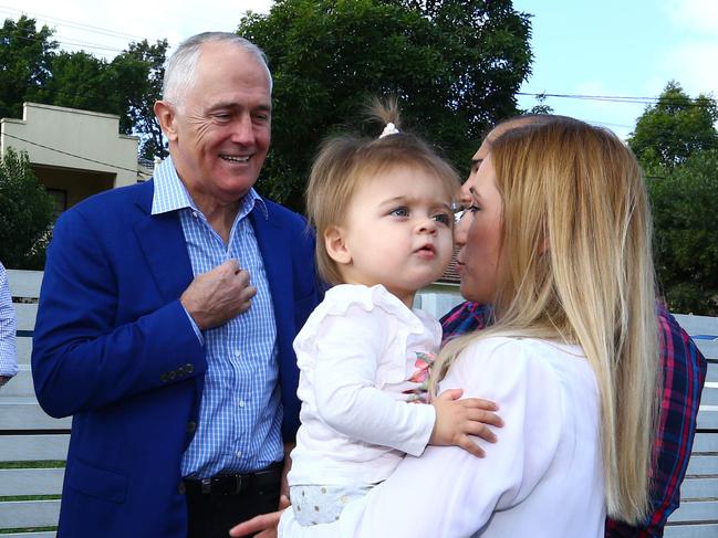 24/04/2016. Prime Minister Malcolm Turnbull, Treasurer Scott Morrison and local member for Banks David Coleman meet with local family Julian and Kim Mignacca and daughter Addison 1 in Penshurst, Sydney. Turnbull announces there will be no changes to negative gearing. Britta Campion / The Australian.