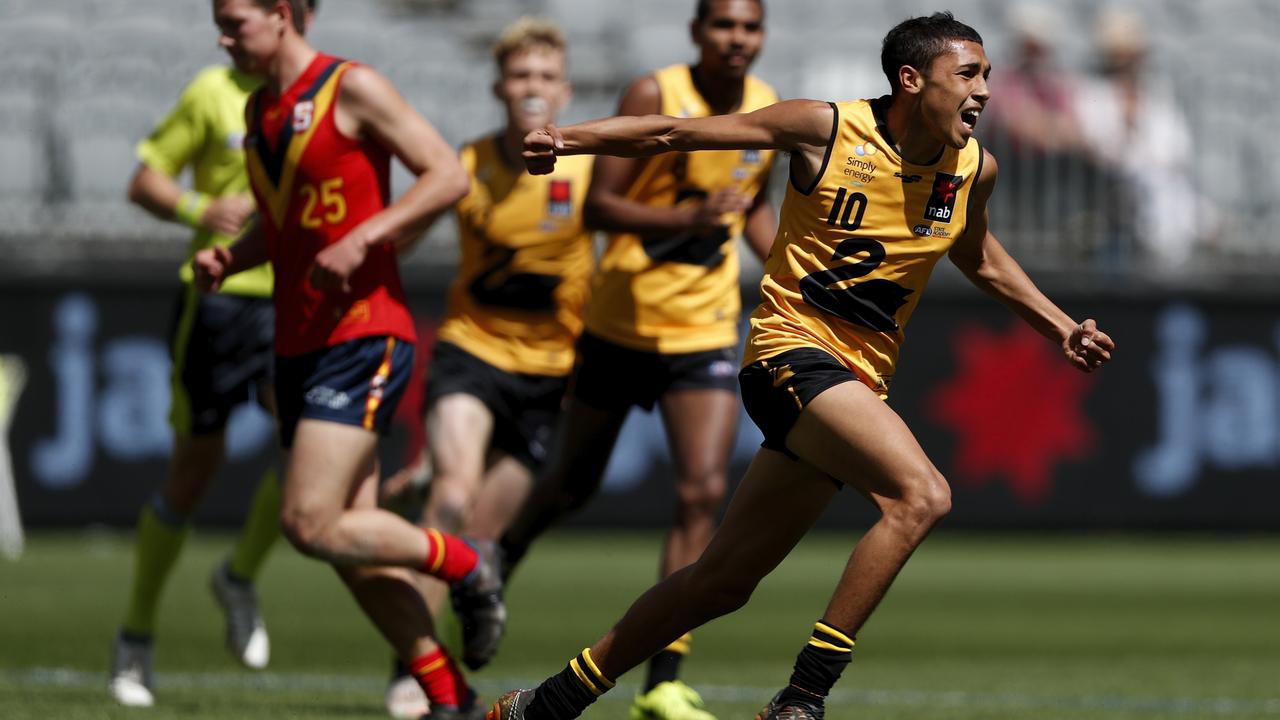 Small forward Arthur Jones celebrates his eye-catching goal against SA. Picture: Dylan Burns/AFL Photos