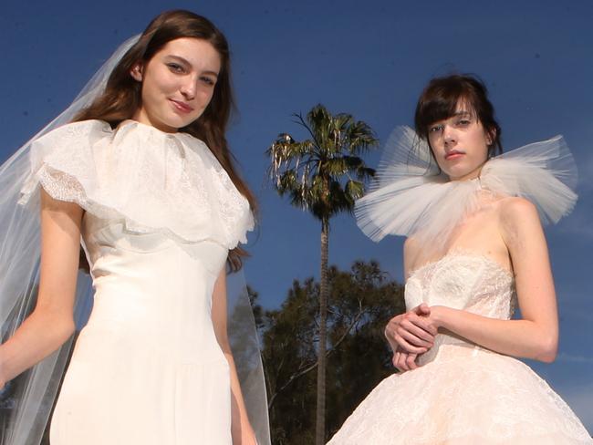 Model wearing a Vera Wang wedding dress. L-R, Julz Propsting - wearing a Lexi and Ashlee Alland wearing a Sigourney. Pic Chris Pavlich