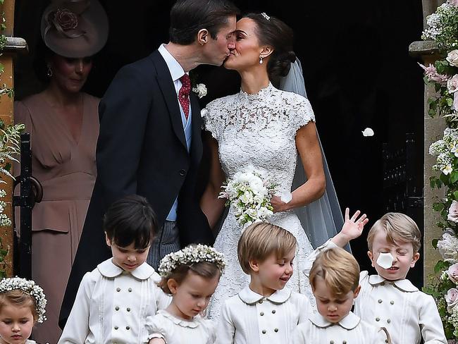 Prince George and Princess Charlotte were both in the bridal party for the wedding of Pippa Middleton and James Matthews last year. Picture: AFP PHOTO / POOL / Justin TALLIS.