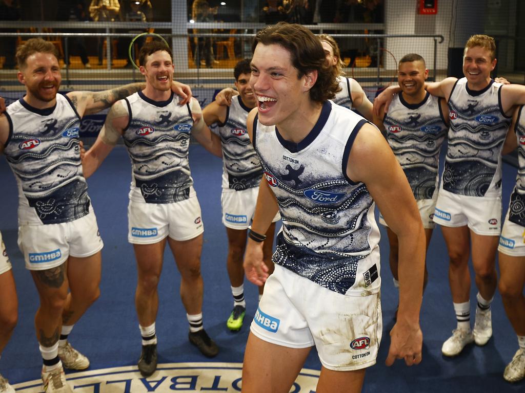 GEELONG, AUSTRALIA – MAY 28: Shannon Neale of the Cats sings the team song with teammates after winning the round 11 AFL match between the Geelong Cats and the Adelaide Crows at GMHBA Stadium on May 28, 2022 in Geelong, Australia. (Photo by Daniel Pockett/AFL Photos/Getty Images)
