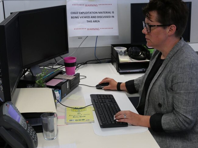 ACCCE Evaluation and Referral team leader Federal Agent Rebecca Goddard at her desk.