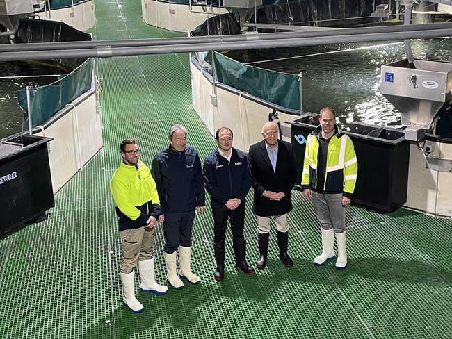 From left, BC Electrical automation engineer Ryan Flint, freshwater operations manager at Huon Aquaculture David Mitchell, Huon Aquaculture CEO Henry Batiste, Industry minister Eric Abetz and a Huon Aquaculture employee inside the current Whale Point facility.