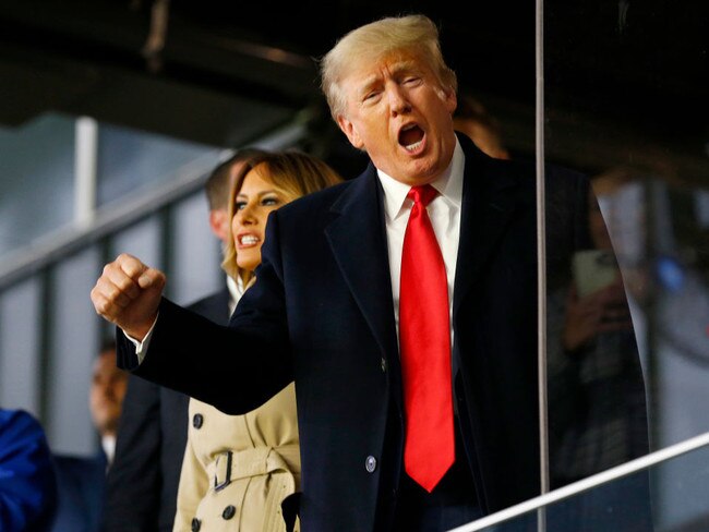 Donald Trump and his wife Melania at a baseball game.