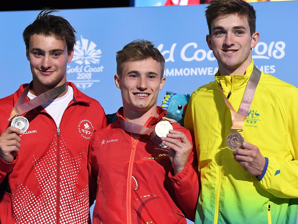 Australia’s James Connor (right) with silver medallist Phillipe Gagne of Canada and gold medallist Jack Laugher of England on Thursday.