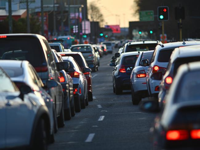 Vehicles line up in peak hour traffic on Moorhouse Avenue in Christchurch, New Zealand.