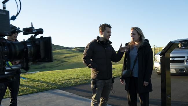 A photo of Australian director Leigh Whannell and Elisabeth Moss, behind the scenes on The Invisible Man shot in Sydney. Photo: Universal Pictures.