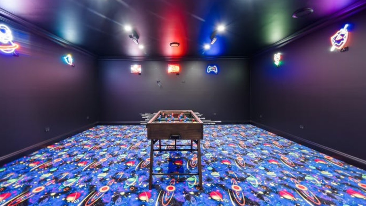 The home at 51 Hillview Pde comes with an arcade games room with light-up carpets.