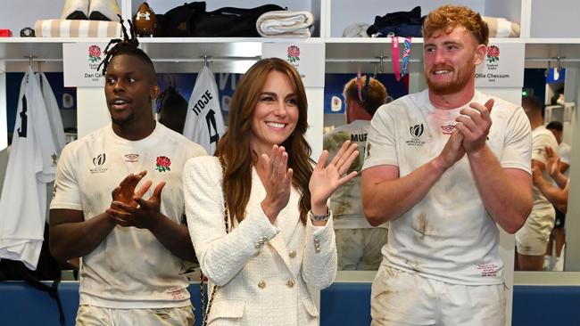 MARSEILLE, FRANCE - OCTOBER 15: Catherine, Princess of Wales and Patron of the Rugby Football Union congratulates the England team on their victory in the changing room following the Rugby World Cup France 2023 Quarter Final match between England and Fiji at Stade Velodrome on October 15, 2023 in Marseille, France. (Photo by Dan Mullan/Getty Images)