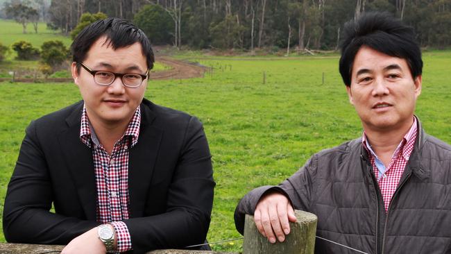 Harry Wang, vice-president of the Ningbo Dairy Group (left), with president Yin Chong Zhang. Picture: File