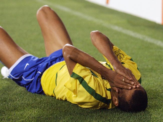 Rivaldo went down like a sack of spuds, clutching at his face.