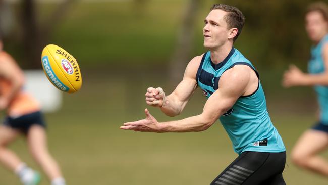 Joel Selwood trains with his teammates over the bye weekend. Picture: Alison Wynd