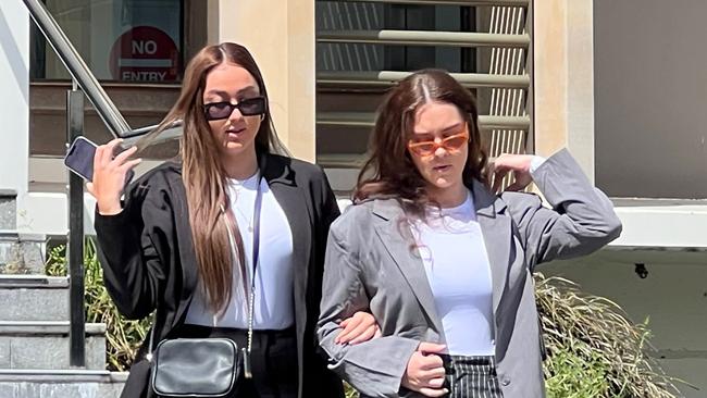 Georgia Hubbard (left) with sister Chelsea Hubbard leaving Wollongong Local Court on Tuesday. Picture: Dylan Arvela