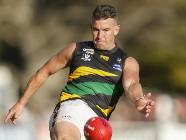 Matt Price, pictured taking a kick for Dromana in the 2018 MPNFL Division 2 grand final, will coach the Tigers in 2020. Picture: Valeriu Campan