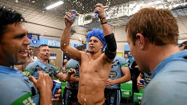 Jack de Belin of the Blues (centre) celebrates with team mates in the change rooms following their win over the Maroons in Game 2 of the 2018 State of Origin series between the NSW Blues and the Queensland Maroons at ANZ Stadium in Sydney, Sunday, June 24, 2018. (AAP Image/Dan Himbrechts) NO ARCHIVING, EDITORIAL USE ONLY. Picture: DAN HIMBRECHTS