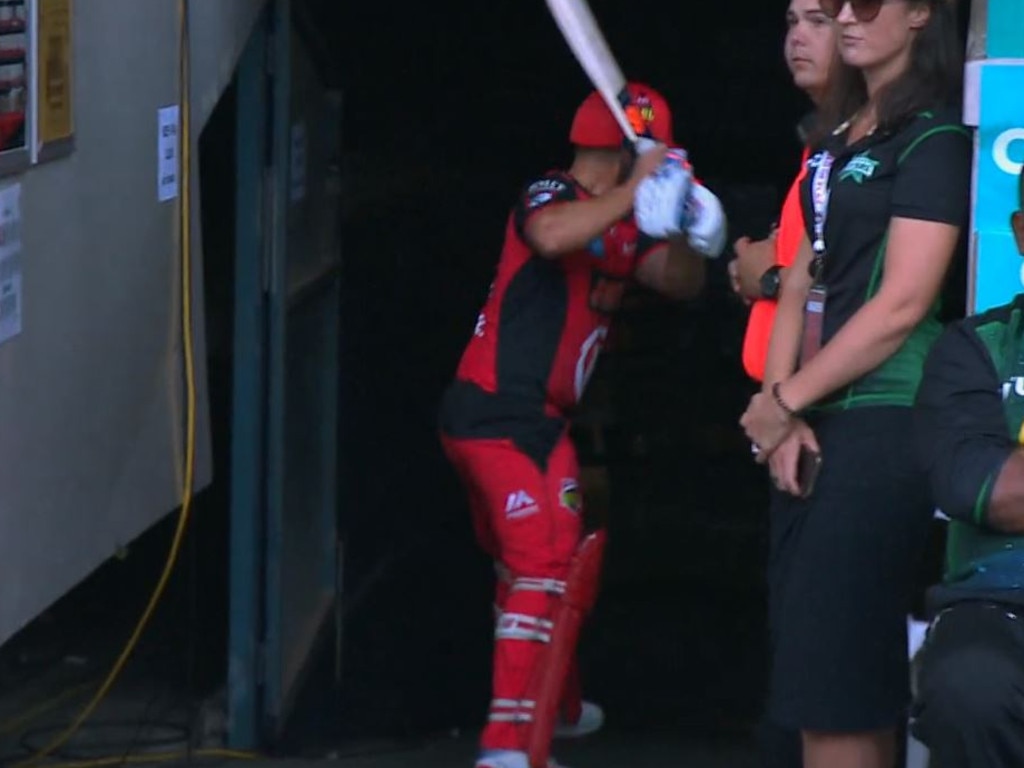 Aaron Finch prepares to demolish a chair after dismissed.