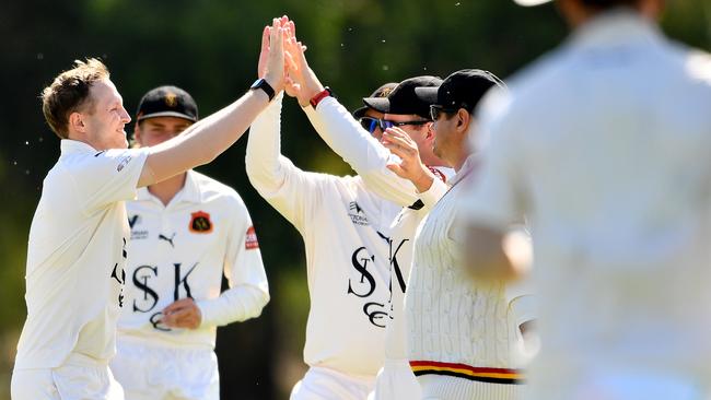 Josh Bartlett celebrates a wicket for St Kilda.