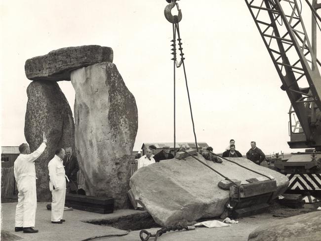 Building works at Stonehenge in 1964 raise a stone that fell over in 1963.