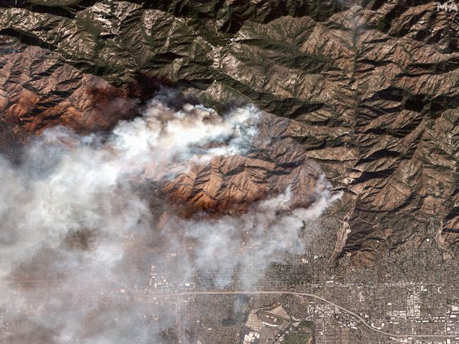 Smoke rising from the Eaton fire as it burns in Altadena, California. Picture: Maxar Technologies/AFP