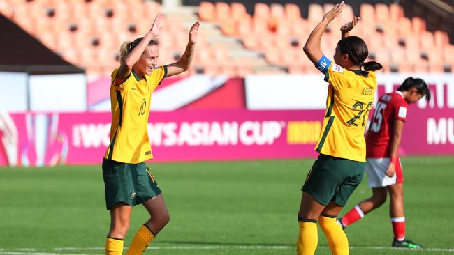 Emily van Egmond (left) celebrates with Matildas captain Sam Kerr at the Asian Cup. Picture: Thananuwat Srirasant / Getty Images