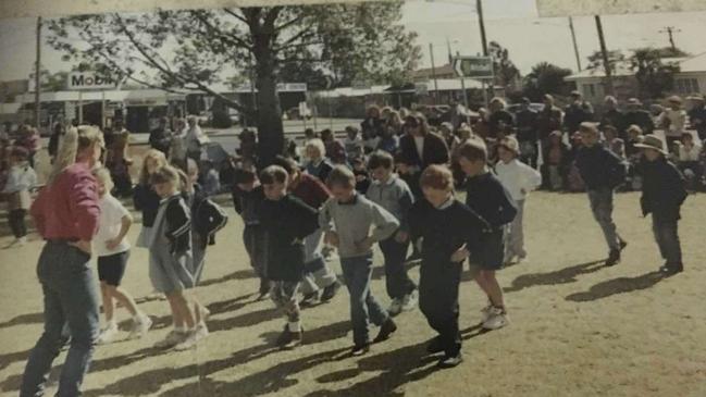 Mrs Merrick teaches line dancing at the Roma Junior fete in 1994. Photo: Wendy Merrick.