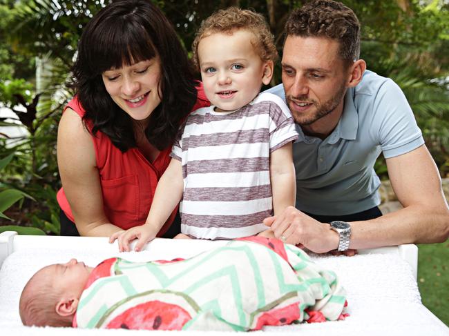 Other brother Sam Ferguson, aged 2.5, with one-week-old sister Georgie, mum Laura and dad Eddie. Picture: Adam Yip