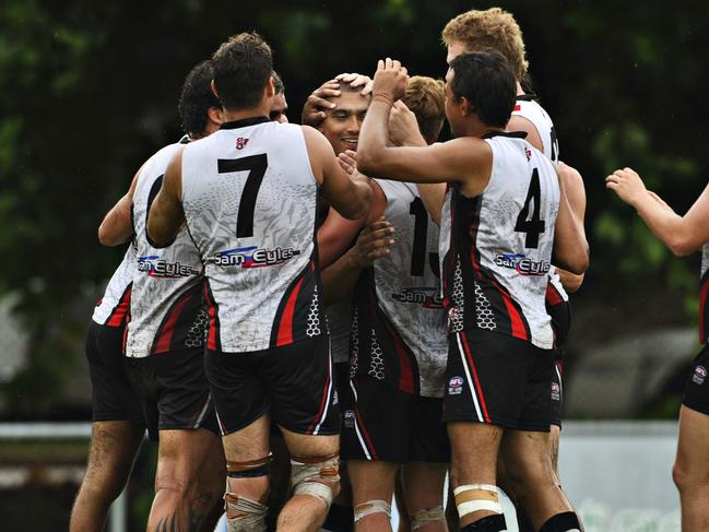 Damian Cupido (19) celebrates kicking 100 goals for Southern Districts in the NTFL.