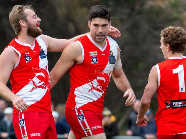 Sorrento's Leigh Poholke congratulates Chris Dawes on his goal. Picture: Jay Town