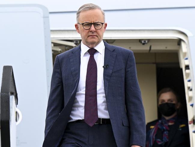 Australian Prime Minister Anthony Albanese disembarks the plane on arrival in Perth, Australia, Tuesday, July 5, 2022. Mr Albanese arrived back in Australia following a 8-day long trip to Europe. (AAP Image/Lukas Coch) NO ARCHIVING