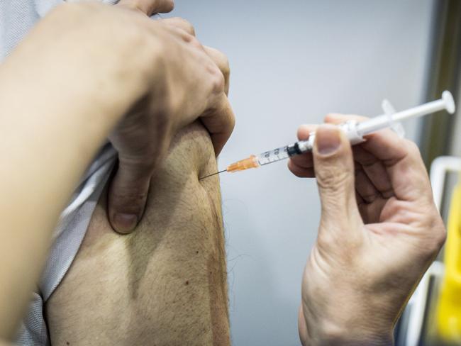 People are urged to get vaccinated. Picture: Tony McDonough/NCA NewsWire,