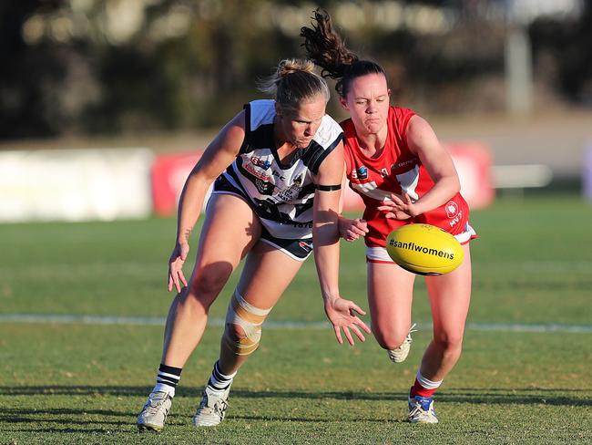 North Adelaide's Julia Clark battles South Adelaide's Lauren Buchanan during the 2020 round four SANFLW clash. Picture: Deb Curtis