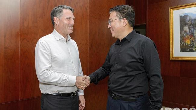 Marles meets Guo Yezhou, deputy head of the Chinese Communist Party's International Liaison Department in 2019.