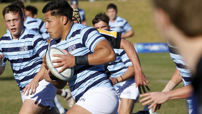 GPS2's Tyrese Lokeni with the ball in a trials match.