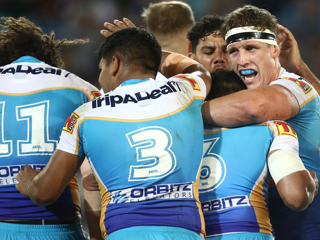 GOLD COAST, AUSTRALIA - APRIL 12: Jarrod Wallace and the Titans celebrates a penalty during the round five NRL match between the Gold Coast Titans and the Penrith Panthers at Cbus Super Stadium on April 12, 2019 in Gold Coast, Australia. (Photo by Chris Hyde/Getty Images)