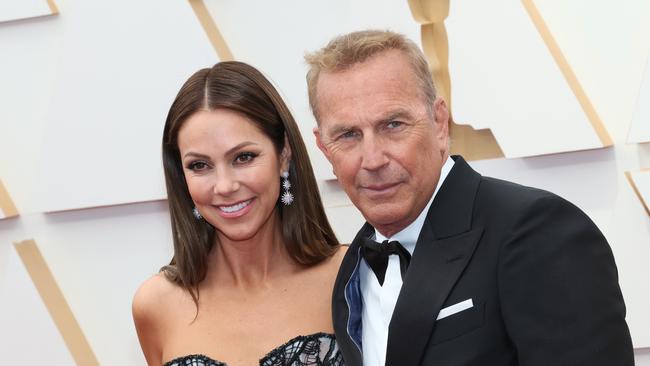 Happier times: With Costner at the 2022 Oscars in March of last year. Picture: Getty