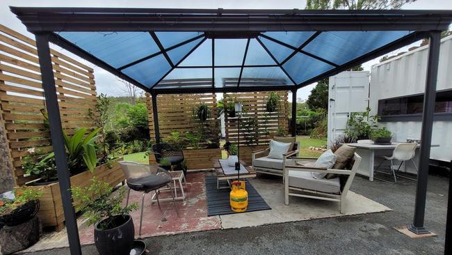 It includes an outdoor entertaining area with barbecue facilities.