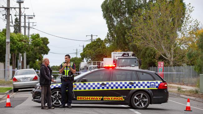 Greensborough Highway Patrol officers at the scene of a fatal crash. Picture: Sarah Matray