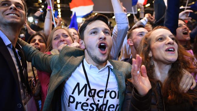 Macron supporters celebrate after the first round results. Picture: AFP