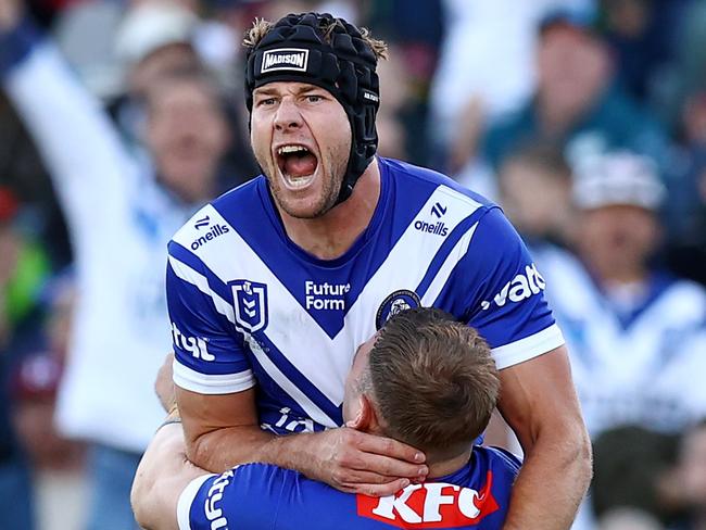 CANBERRA, AUSTRALIA - MAY 10: Matt Burton of the Bulldogs celebrates a try by team mateMax King during the round 10 NRL match between Canberra Raiders and Canterbury Bulldogs at GIO Stadium, on May 10, 2025, in Canberra, Australia. (Photo by Mark Nolan/Getty Images)