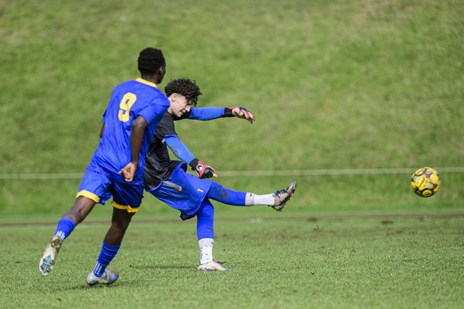 Churchie goalkeeper Josh Tanner clears the ball against TGS in Round 4 GPS First XI football competition at Grammar, Saturday, May 17, 2025. Picture: Kevin Farmer