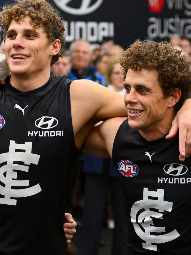 Lorne coach Ed Curnow, right, with brother Charlie after a Carlton win last year. Picture: Morgan Hancock