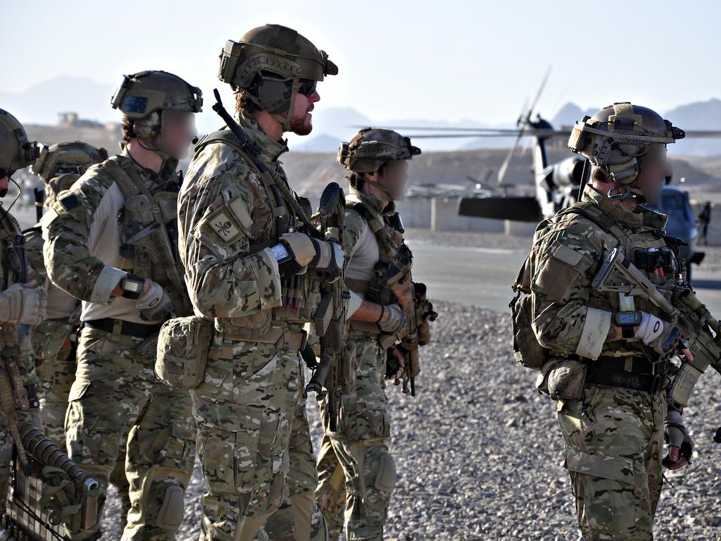 SAS Corporal Ben Roberts-Smith VC., MG., (left of centre) with the Australian Special Operations Task Group prepares to deploy to the Shah Wali Kot Offensive, Afghanistan, in June 2010. Picture: Department of Defence